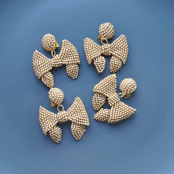 Beaded Bow gold yellow beige white earrings,Drape beaded earrings,handmade bead earrings,trendy clip on earrings,wedding earrings