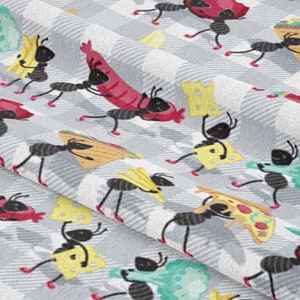 May include: A grey and white checked fabric with a repeating pattern of black ants carrying various food items, including pizza, watermelon, hot dogs, and chips.