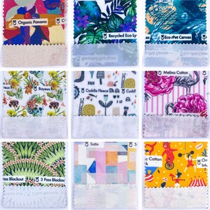 May include: Nine fabric swatches with different patterns and textures. The swatches are labeled with the names of the fabrics, including "Organic Panama", "Recycled Eco Ly", "Eco rPet Canvas", "Cuddle Fleece", "Melino Cotton", "3 Pass Blackout", "Satin", ".c Cotton", and "Or Int."