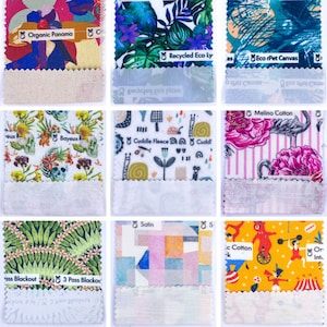 May include: Nine fabric swatches with different patterns and textures. The swatches are labelled with the names of the fabrics, including "Organic Panama", "Recycled Eco Ly", "Eco rPet Canvas", "Cuddle Fleece", "Melino Cotton", "3 Pass Blackout", "Satin", ".c Cotton", and "Or Int."