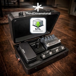 May include: Open wooden case with various electronic music equipment. The case contains a black pedal, a silver effects pedal, and other components. The case has the text "ThirdDimensional" and an icon with the text "STL DOWNLOAD".