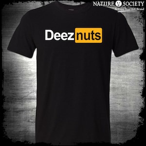 May include: Black t-shirt with the text "Deez nuts" in white letters on a yellow rectangle.