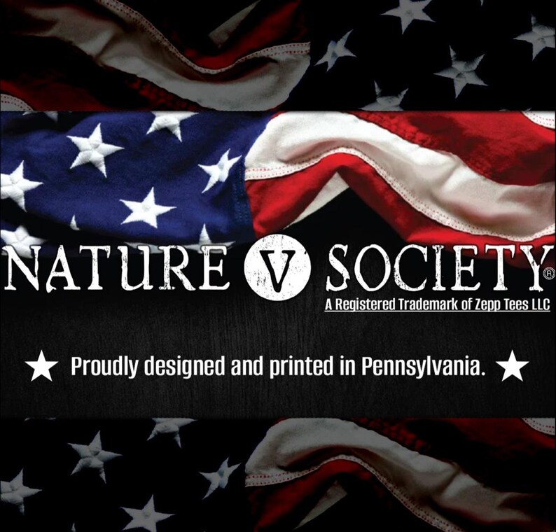 May include: A black and white graphic design with the text "NATURE V SOCIETY" and the words "A Registered Trademark of Zepp Tees LLC" and "Proudly designed and printed in Pennsylvania." The graphic is set against a backdrop of a red, white, and blue American flag.