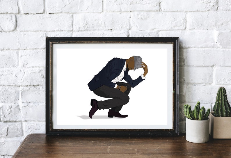 May include: A man in a blue suit and a gray hat is crouching down with his head in his hands.