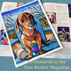 May include: A colorful illustration of a dachshund wearing a rainbow tie and sitting on a blue chair. The dog is holding a baseball in its paws. The illustration is featured in "The New Barker" magazine.