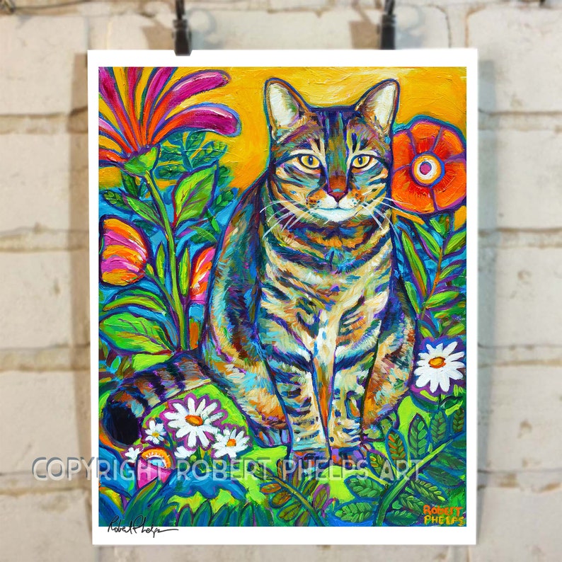 May include: A colorful painting of a tabby cat sitting in a garden with bright flowers. The cat is looking directly at the viewer. The background is a vibrant yellow with green and blue foliage.