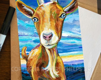 May include: A painting of a brown and white goat with blue eyes, looking directly at the viewer. The goat is painted in a colorful style with bright blue, yellow, and purple accents. The background is a blue sky with white clouds.