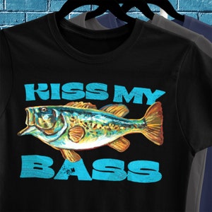 May include: Black t-shirt featuring a blue and yellow bass fish graphic with the text "Kiss My Bass" in blue.