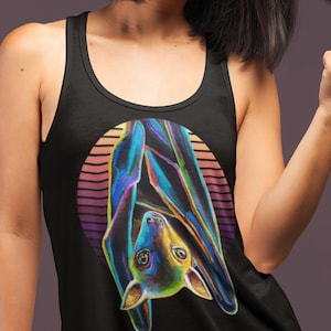 May include: A black tank top featuring a colourful illustration of a bat hanging upside down within a retro-style circle. The bat is iridescent with blue, green, and purple shades.
