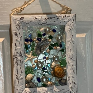 Resin turtle in floral carved frame-reduced
