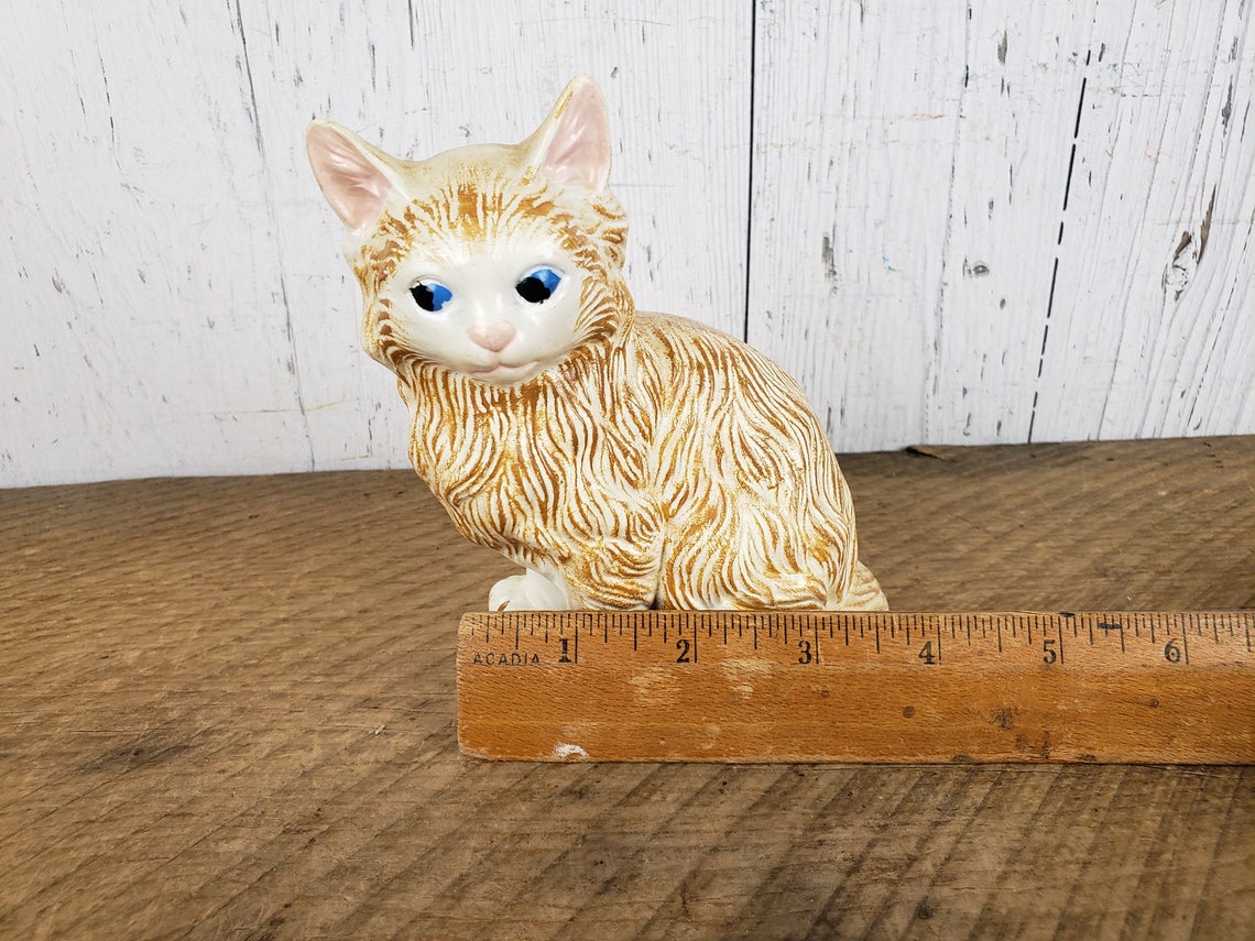 orange tabby cat statue