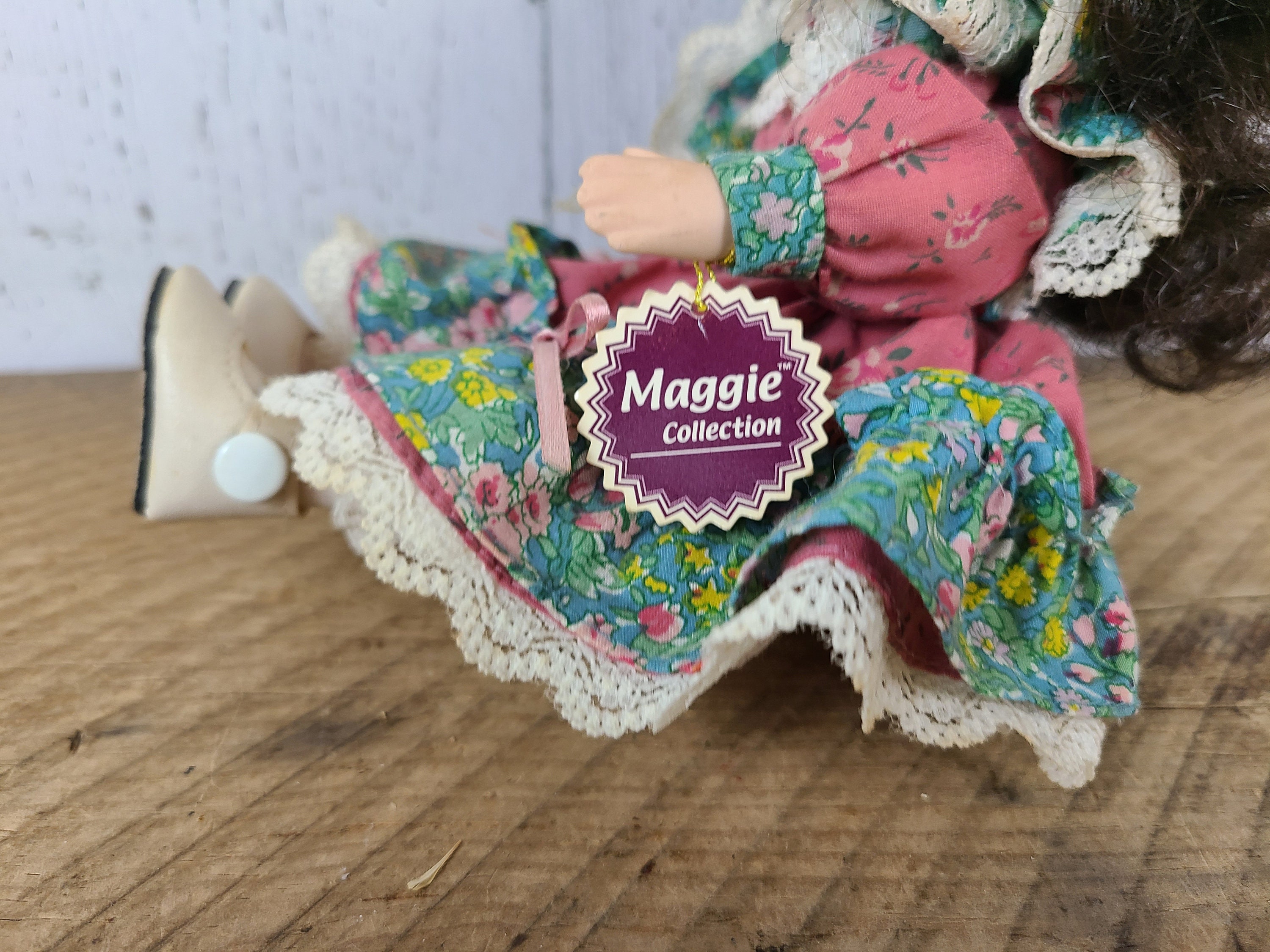 Maggie collection porcelain doll hotsell