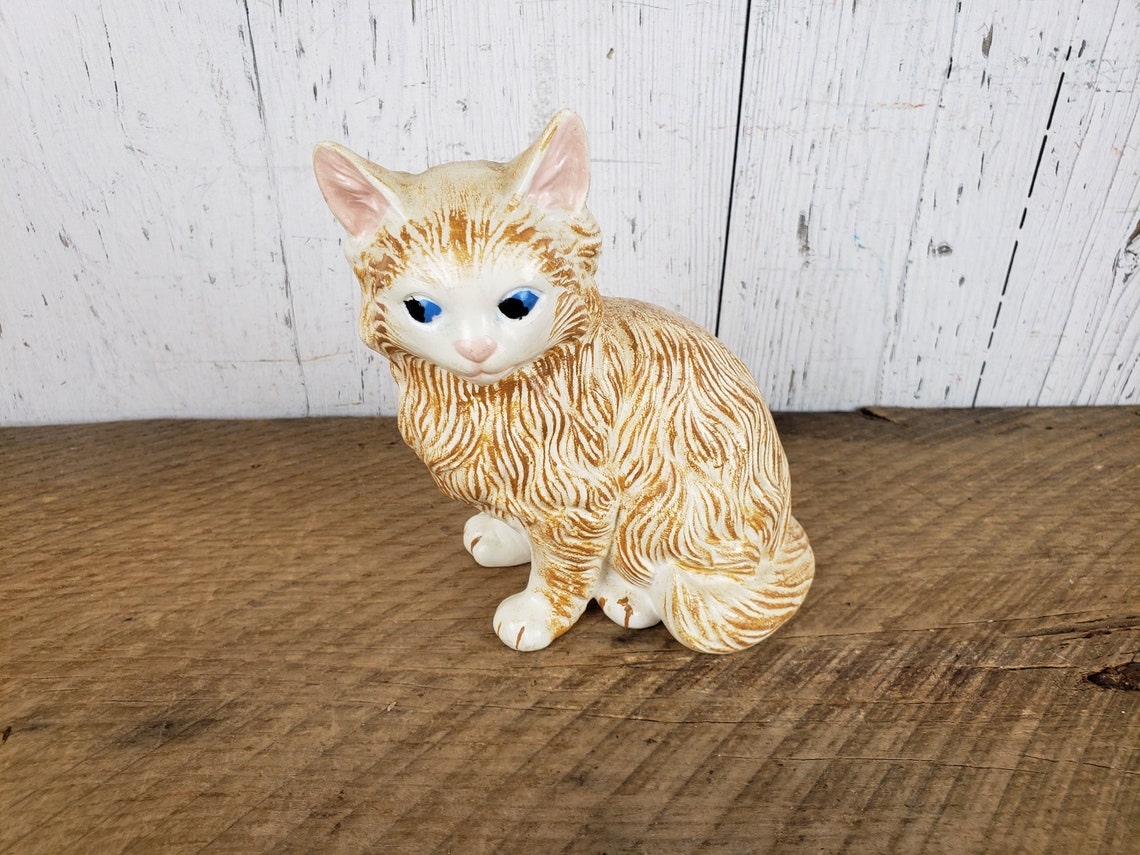 orange tabby cat statue