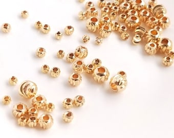 2,5/3/4/5 mm 10/50/100 piezas Cuentas espaciadoras de latón chapadas en oro real de 14 quilates, cuentas de oro con corte de diamante