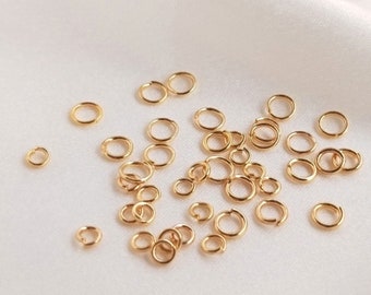 100pcs 14K anillos abiertos de latón chapado en oro real, anillos de salto chapados en oro, anillos de oro