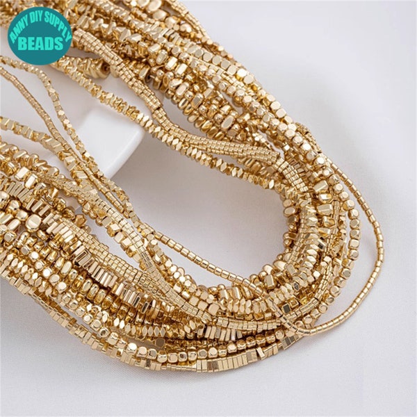 Cuentas espaciadoras de hematita bañadas en oro de 14 quilates: pequeñas cuentas de semillas, tira de 15 pulgadas