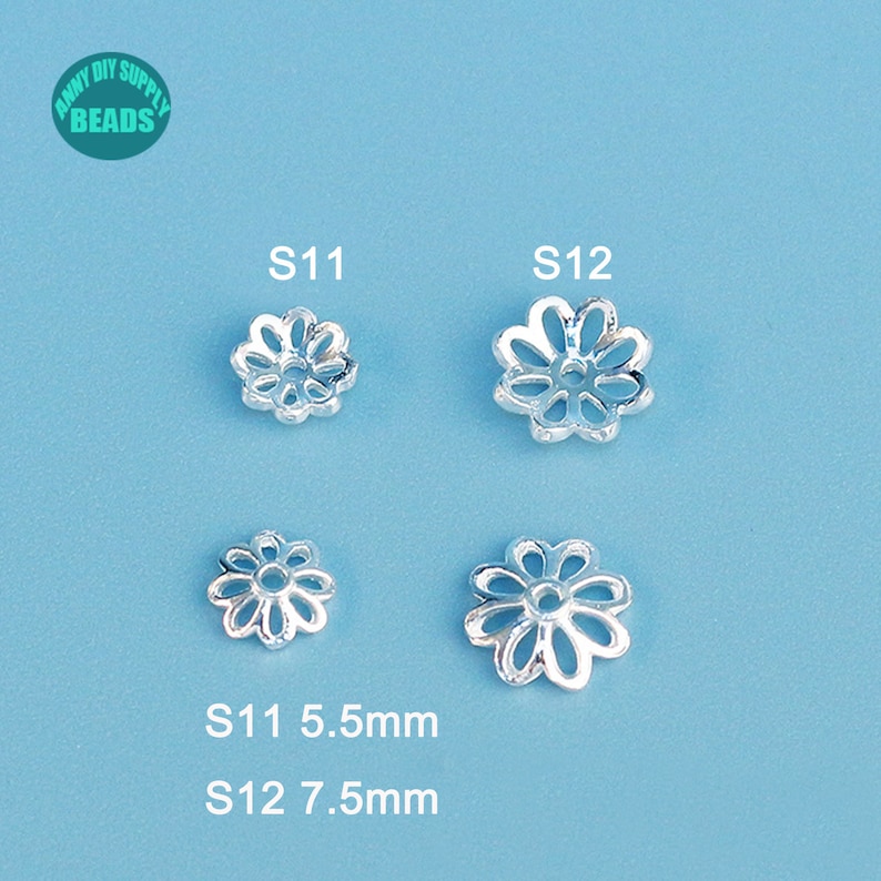May include: Four silver-colored flower-shaped bead caps, two each of two sizes, against a light blue background. The smaller caps are 5.5mm, and the larger ones are 7.5mm. The text "ANNY DIY SUPPLY BEADS" is in a green circle in the upper left corner.