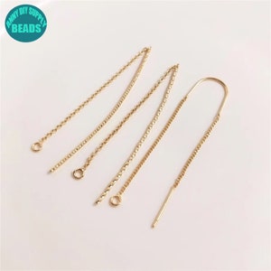 Puede incluir: Cinco extensiones de cadena de pendientes de oro con anillas de salto. Las cadenas son de diferentes longitudes y estilos. Una cadena es un simple alambre recto.