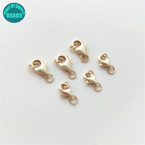 【LES CLEIAS】エストレラの金メッキチップ ステンレス クロスネックレス ゴールド [n980-gold-n514-3mm