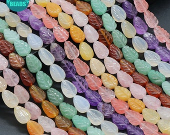 May include: A strand of colourful leaf-shaped gemstone beads. The beads are made of various types of natural stone, including amethyst, rose quartz, agate, and jade. The beads are strung on a clear elastic cord and are ready to be used for jewellery making.