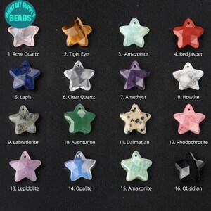 May include: A set of 16 star-shaped gemstone beads, each with a different colour and type of stone. The beads are arranged in four rows of four, with the names of the stones listed below each bead. The stones include rose quartz, tiger eye, amazonite, red jasper, lapis lazuli, clear quartz, amethyst, howlite, labradorite, aventurine, dalmatian, rhodochrosite, lepidolite, opalite, amazonite, and obsidian.
