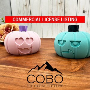 May include: Two 3D-printed pumpkin decorations. One is light pink with heart-shaped eyes and a smiling mouth. The other is teal with a grumpy face. Both have stems. The image includes the text "COMMERCIAL LICENSE LISTING" and a logo.
