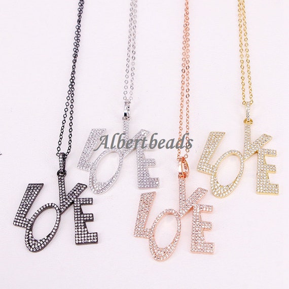 AZYZ303-8096 Micro Pave CZ Stones Copper Metal Love Letters