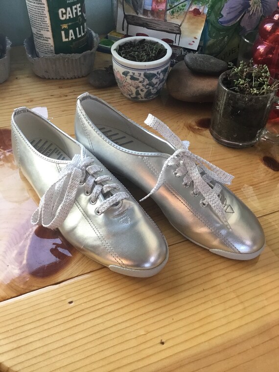 silver tennis shoes