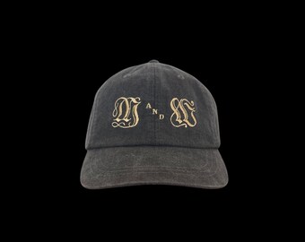 Hoed met monogram man en heks