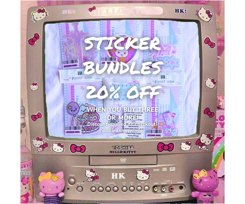 May include: A vintage Toshiba Hello Kitty television decorated with Hello Kitty stickers. The screen displays sticker bundles with a 20% off promotion. The image includes two Hello Kitty figurines and the text "STICKER BUNDLES".