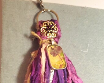 Boho Sari Silk Keychain/Purse tassel or rearview mirror decor.Beautiful and colorful with so many charms. A true labor of love by me for you
