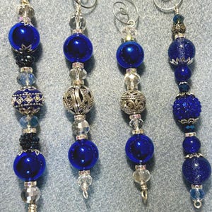 Beautiful and sparkly Icicle ornaments , shades of Blue and Silver so sparkly . Handmade,Christmas ornament,great gift.