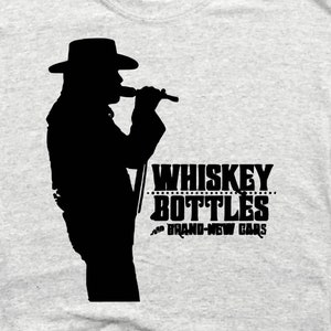 Whiskey bottles and brand new cars. Lynyrd Skynyrd. Rock and roll,southern rock. Great band. Support southern rock.