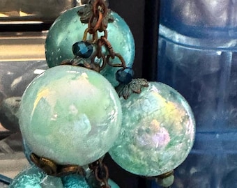 Gorgeous Chunky purse charm in different styles of turquoise / aqua bubble gum beads. Great Mother’s Day, birthday or just because gift.