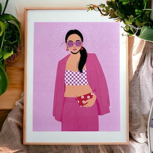 May include: A digital illustration of a woman wearing a pink blazer, a checkered crop top, and pink pants. She is wearing sunglasses and holding a red purse with white flowers. The background is a light purple color with a starburst effect.