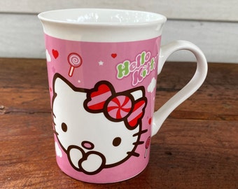 10oz Hello Kitty Mug 4" Tall White & Pink with Candy Lollypops - Sanrio Co and Frankford Candy 1976 Copywrite Dishwasher and Microwave Safe