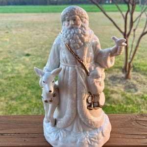 Music Box Christmas Around the World Plays “ Santa Claus is coming to town” Hand Painted Porcelain Santa Christmas Plays WHITE CHRISTMAS