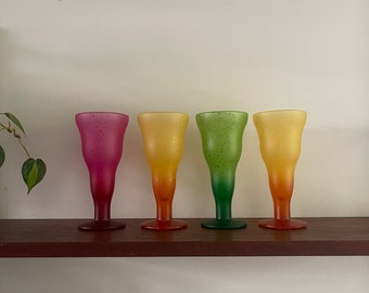 1990s vintage colored neon sundaes, speckled glasses bright colors pink yellow orange green.