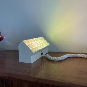 Philips wall lamp FWN229, Dutch design brutalist wall or table lamp with telephone cord and grid / grid