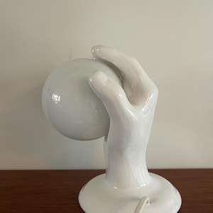 80s wall lamp, hand with light globe white ceramic - eighties design. Magic hand / hand lamp / hand with globe