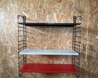 Wall rack wall unit made of metal Tomado, 60s colored bookshelves, wall cupboard. Dutch design vintage bookend