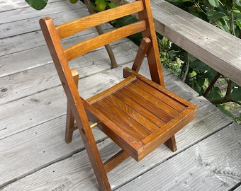 Vintage children's folding chair, collapsible chair, solid wood. Marked folding chair