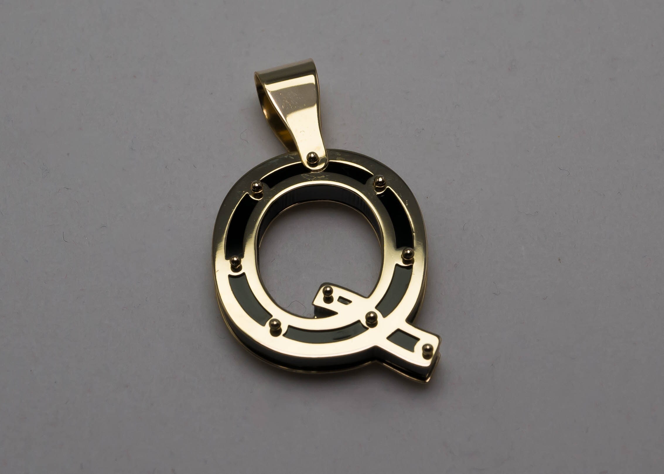 Gold q pendant sale