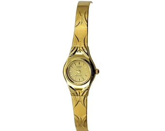 Reloj Citizen Vintage en tono dorado amarillo con esfera dorada para mujer