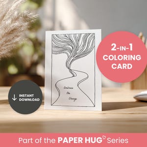 Könnte beinhalten: 2-in-1 Ausmalkarte mit einer Schwarz-Weiß-Linienzeichnung eines Pfades und abstrakten Formen. Die Karte enthält den Text "Embrace the Change" und ist Teil der "PAPER HUG"-Serie. Ein rosa Kreis zeigt "2-IN-1 COLORING CARD".
