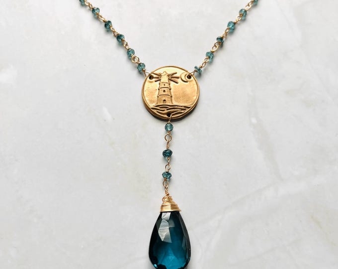 Lighthouse blue topaz necklace. London blue topaz necklace that is a birth stone necklace. Wax seal necklace perfect nautical jewelry gift.