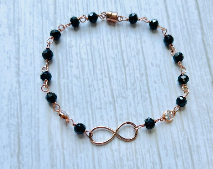 Rose gold bracelet infinity bracelet. Black spinel dainty gold bracelet  with magnetic clasp. Infinity symbol magnetic bracelet.