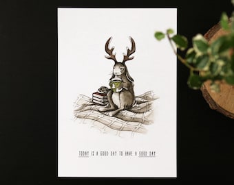 Cozy bunny watercolor Illustration funny greeting card. Hygge home stay in bed humor card. Dressed rabbit with a mug of cocoa animal card