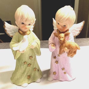 Pair of Lefton angels 1997 girl and boy with deer and one with dove