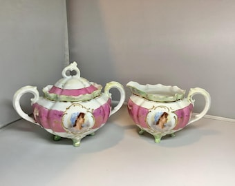 Bellissima lattiera e zuccheriera con coperchio dorato, senza marchio RS Prussia, dipinta a mano.